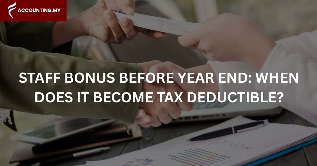 Photo of a person giving another money, representing bonus tax deductible Malaysia